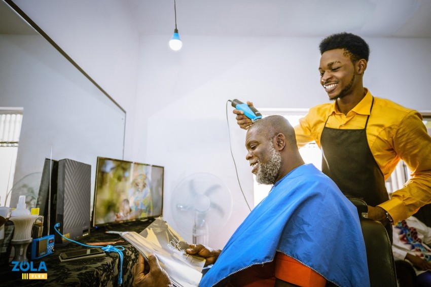ZOLA FLEX Africa Nigeria Lagos Urban SME Barbershop Customer Client on Solar Shoot 95